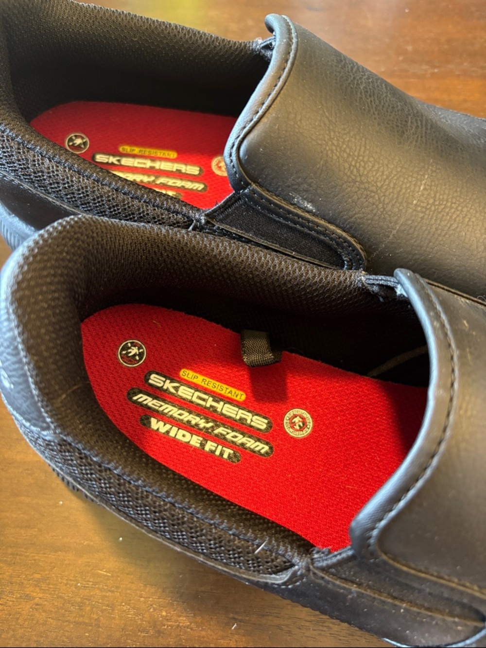 Skechers Black Slip-On Work Shoes with Red Insole non slip, never worn